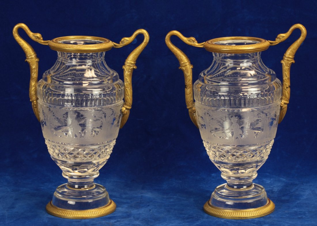 Earlier 19th C. Pair Empire Dore Vase: Earlier 19th C. Pair Empire Dore Bronze and Hand Carved Crystal Vases With handles formed by swan heads.Dimension: 10"H x 7 1/4"W