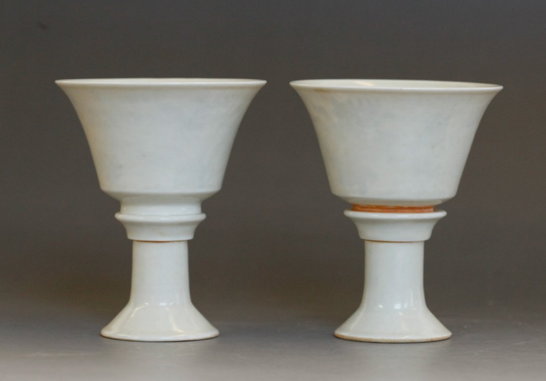 Pair of Twistable Foot Cups, Implied Dragon: Pair of Twistable Foot Cups, Implied Dragon_x000D_ Dimension: 3 1/4 inches diameter by 4 1/4 inches height