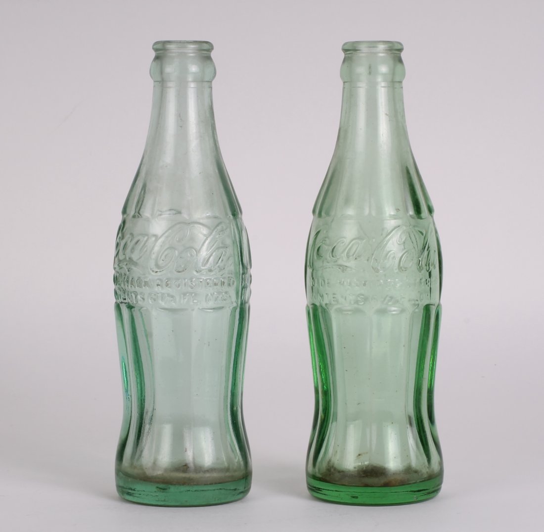 2 Old Version Glass Coca Cola Bottles: 2 Old Version Glass Coca Cola Bottles _x000D_ Dimension: 7 3/4"H