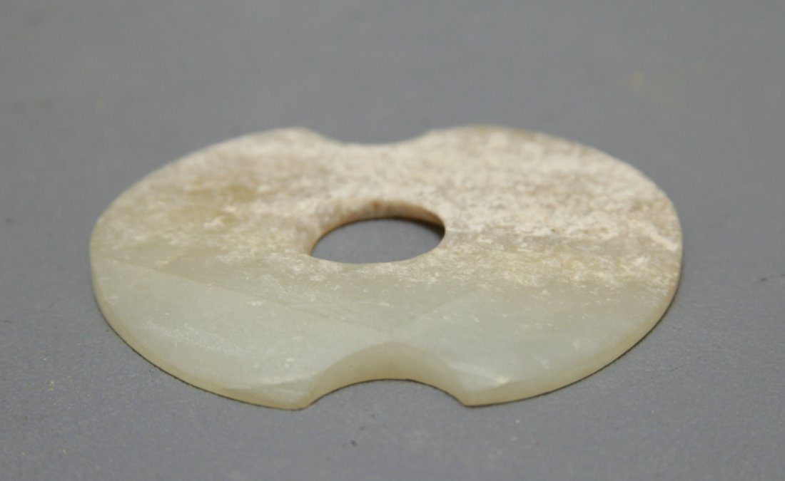 An Early White Jade Bi Disc (1 of 2)