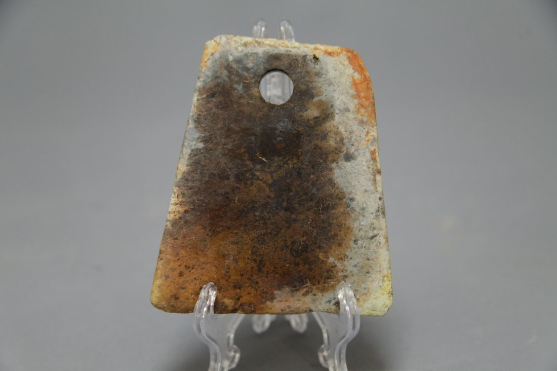 A Multicolored, Calcified Jade Axe Blade (1 of 3)