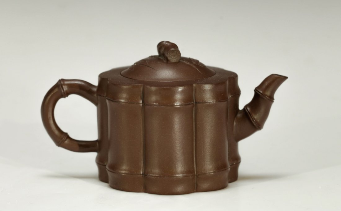 Chinese Yixing Zisha Teapot: Chinese Yixing Zisha Teapot Condition: Excellent Dimension: 3 1/2 inches height by 6 1/4 inches length