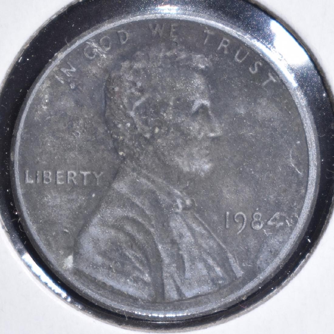 1984 UNPLATED ERROR CENT: WEEKLY COIN & CURRENCY AUCTIONS ESTIMATE $200 - $250.