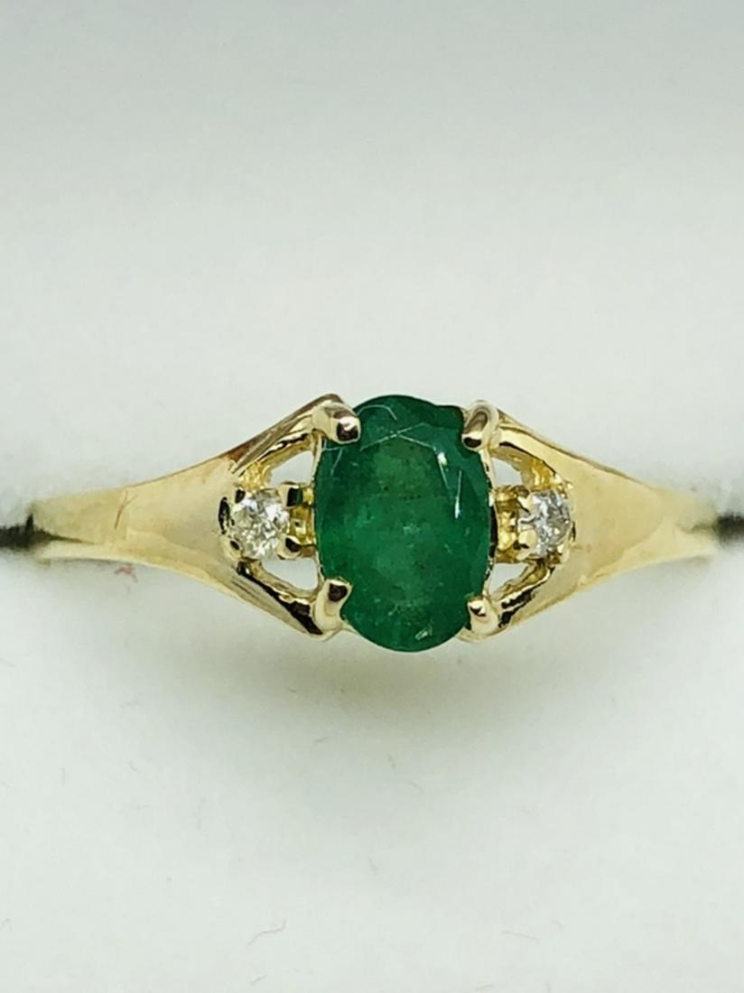 3 PIECE JEWELRY LOT:: 10K YELLOW GOLD EMERALD (0.4cts) DIAMOND (0.03cts) RING (SIZE 6.5), 10K YELLOW GOLD LEMON QUARTZ (2.6cts) EARRINGS & GOLD PLATED STERLING SILVER NATURAL EMERALD (10cts) NECKLACE (18" LONG). ESTIMATE $