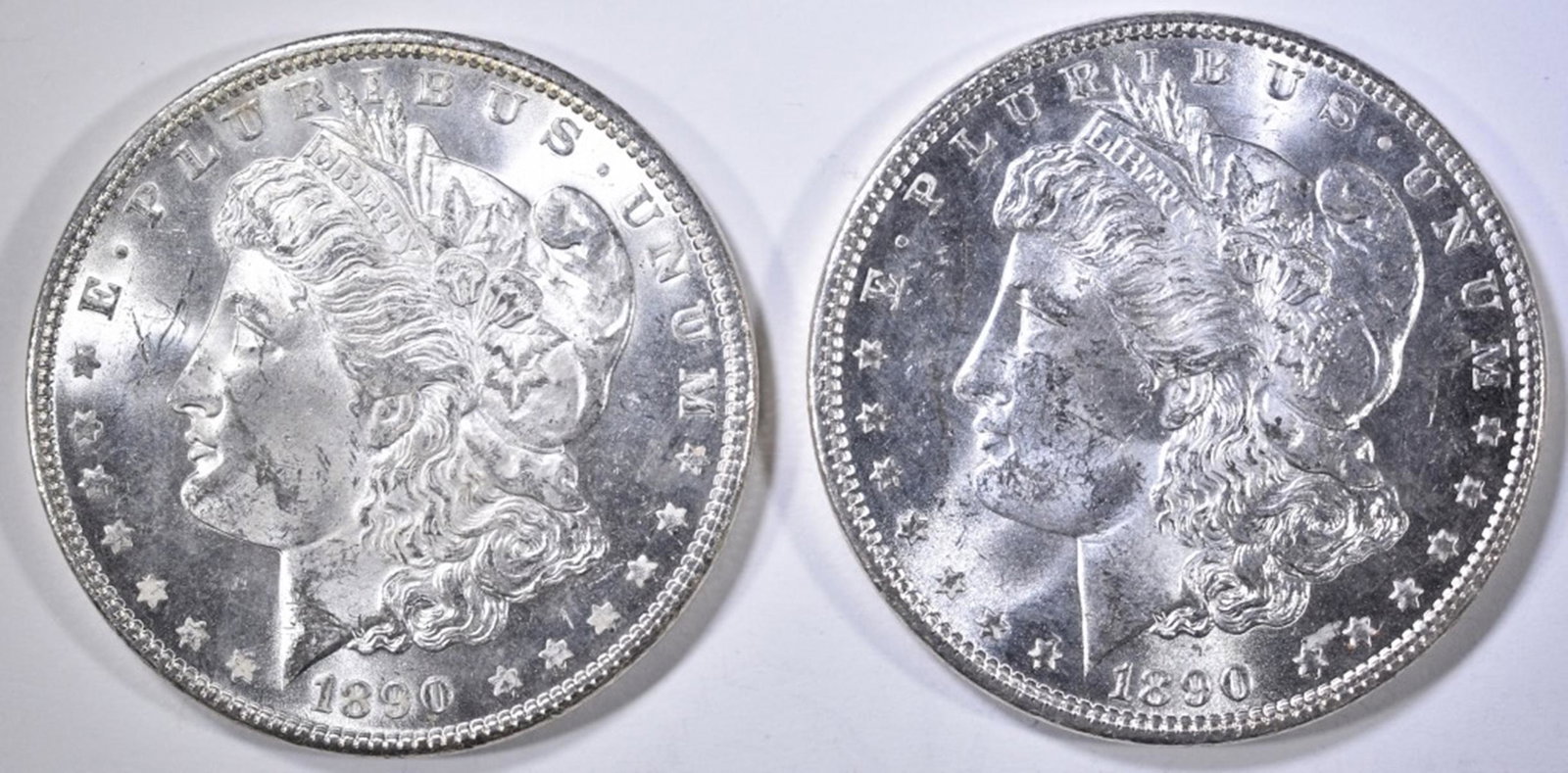 2-1890 MORGAN DOLLARS, CH BU: CHECK OUT OUR UPCOMING ONLINE COIN AUCTIONS ESTIMATE $100 - $120.