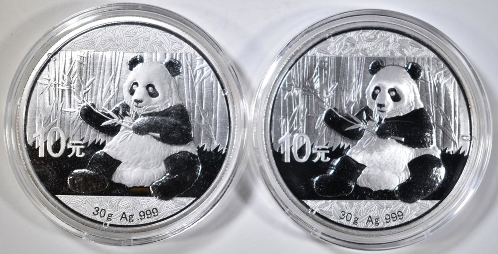2-2017 CHINESE PANDA ONE OUNCE SILVER COINS: TOP RATED AUCTION HOUSE ESTIMATE $85 - $100.
