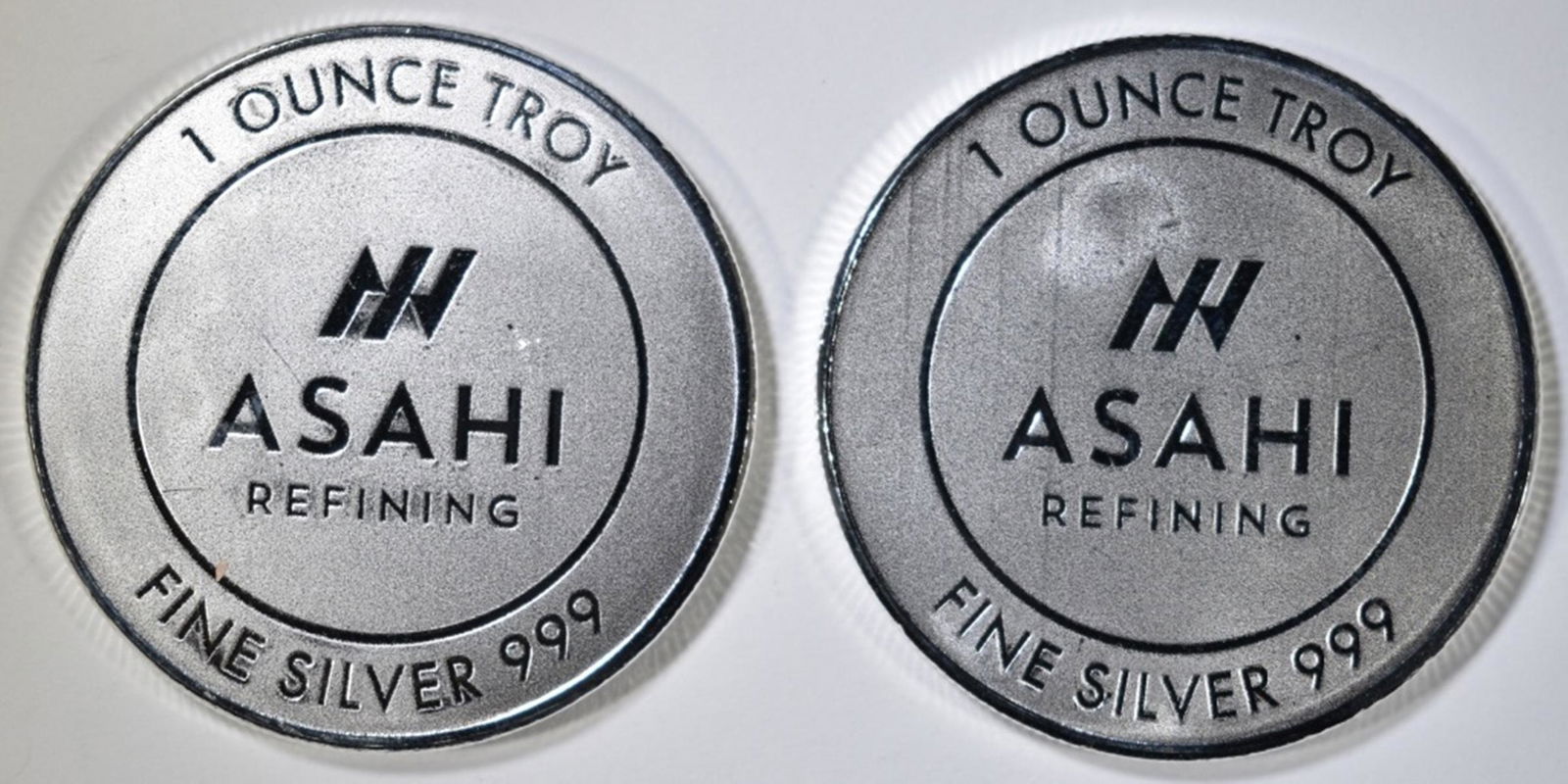 2-ONE OUNCE .999 SILVER ROUNDS ASAHI (1 of 2)