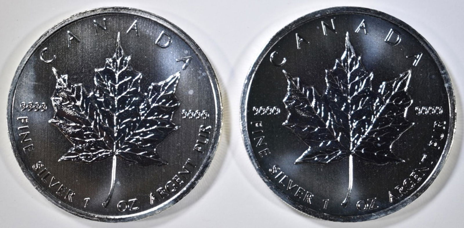2-2011 ONE OUNCE SILVER CANADA MAPLE LEAF COINS (1 of 2)