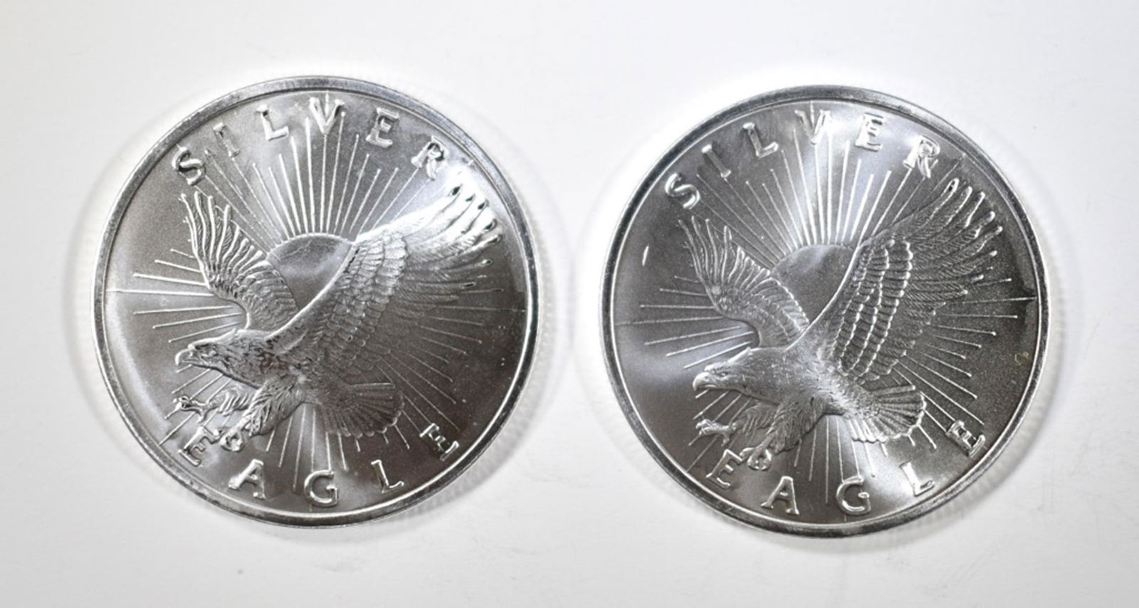 2-SUNSHINE MINT 1_OUNCE .999 SILVER ROUNDS (1 of 2)