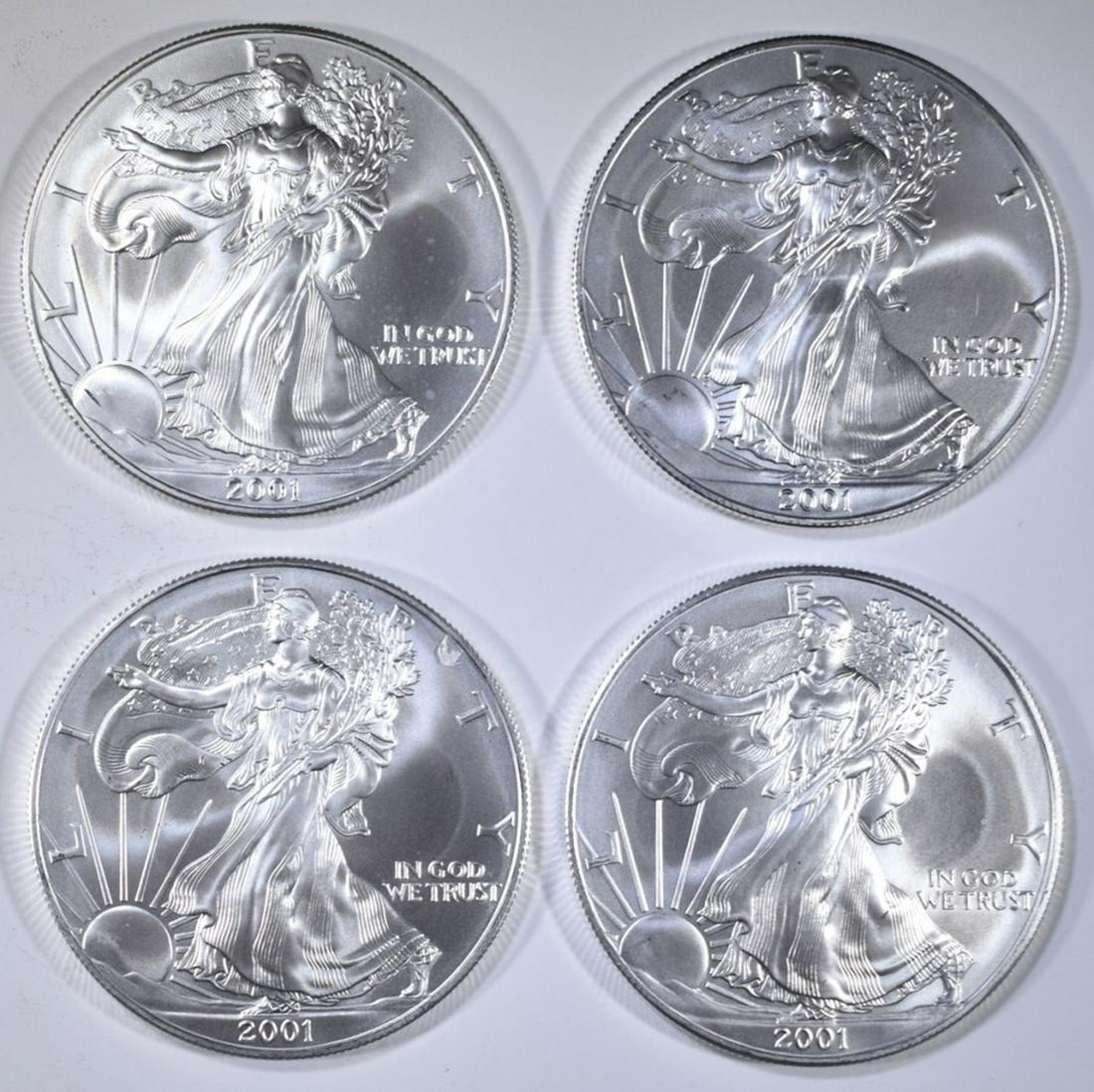 LOT OF 4 2001 AMERICAN SILVER EAGLES: WEEKLY COIN & CURRENCY AUCTIONS ESTIMATE $90 - $110.