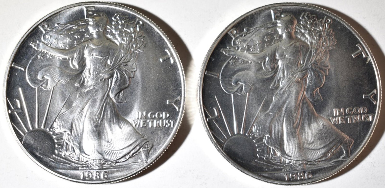 2-BU 1986 AMERICAN SILVER EAGLES: BID WITH SILVER CITY AUCTIONS ESTIMATE $100 - $120.