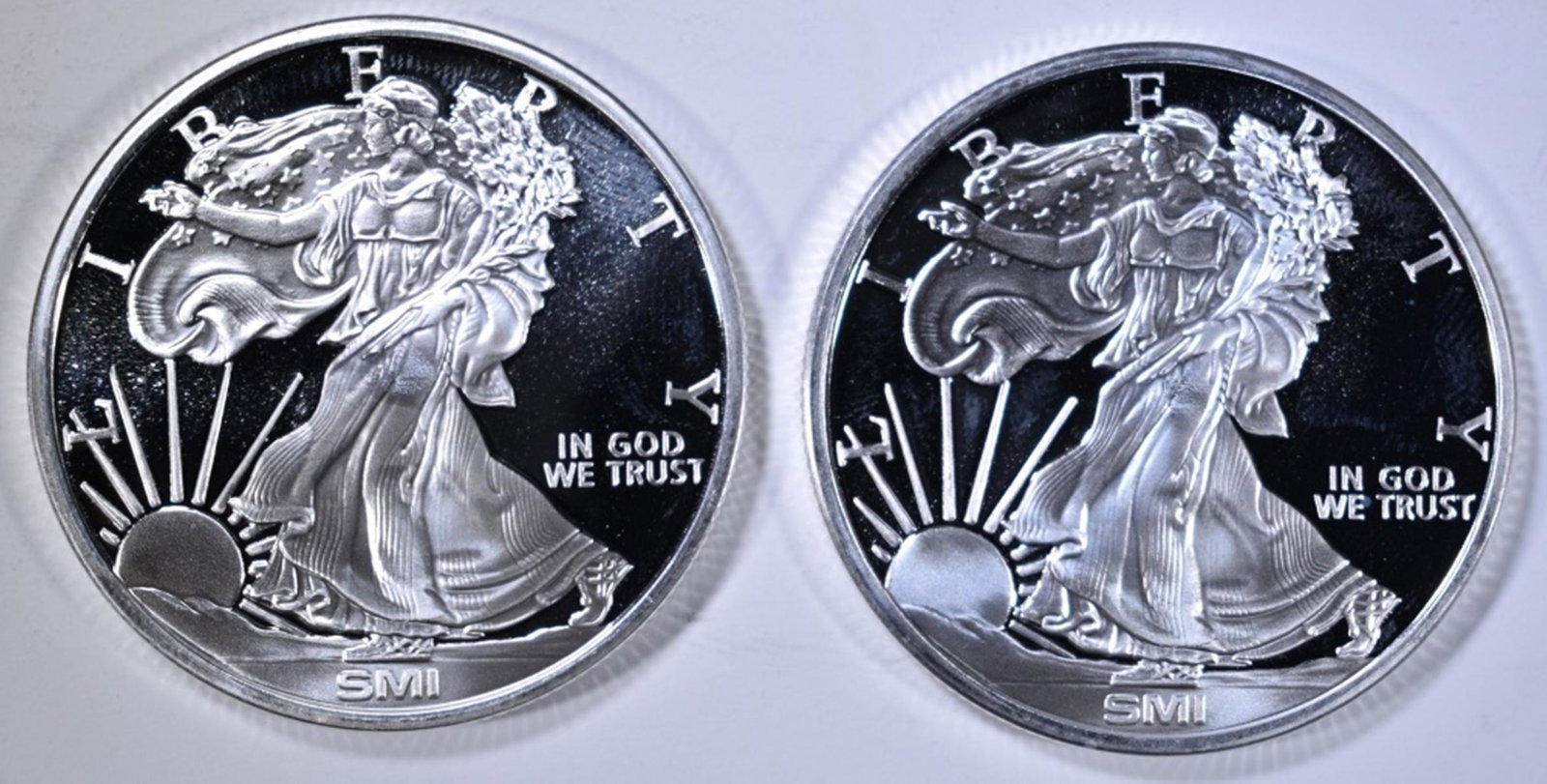2-"WALKING LIBERTY" ONE OUNCE SILVER ROUNDS: WEEKLY COIN & CURRENCY AUCTIONS ESTIMATE $80 - $90.