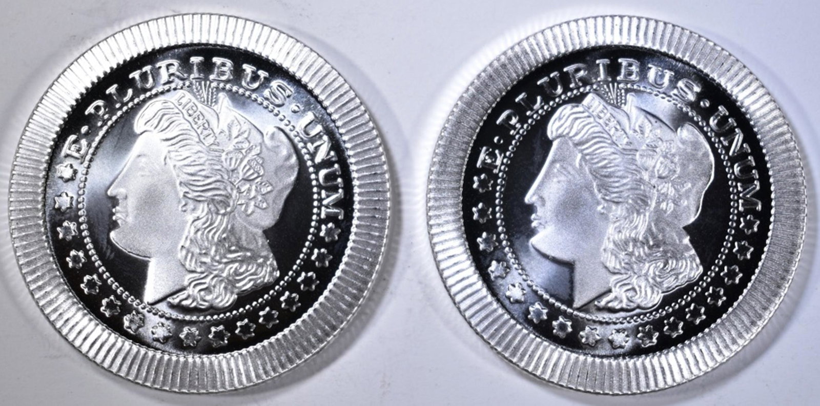 2-"MORGAN" STACKABLE ONE OUNCE SILVER ROUNDS: TOP RATED AUCTION HOUSE ESTIMATE $80 - $90.