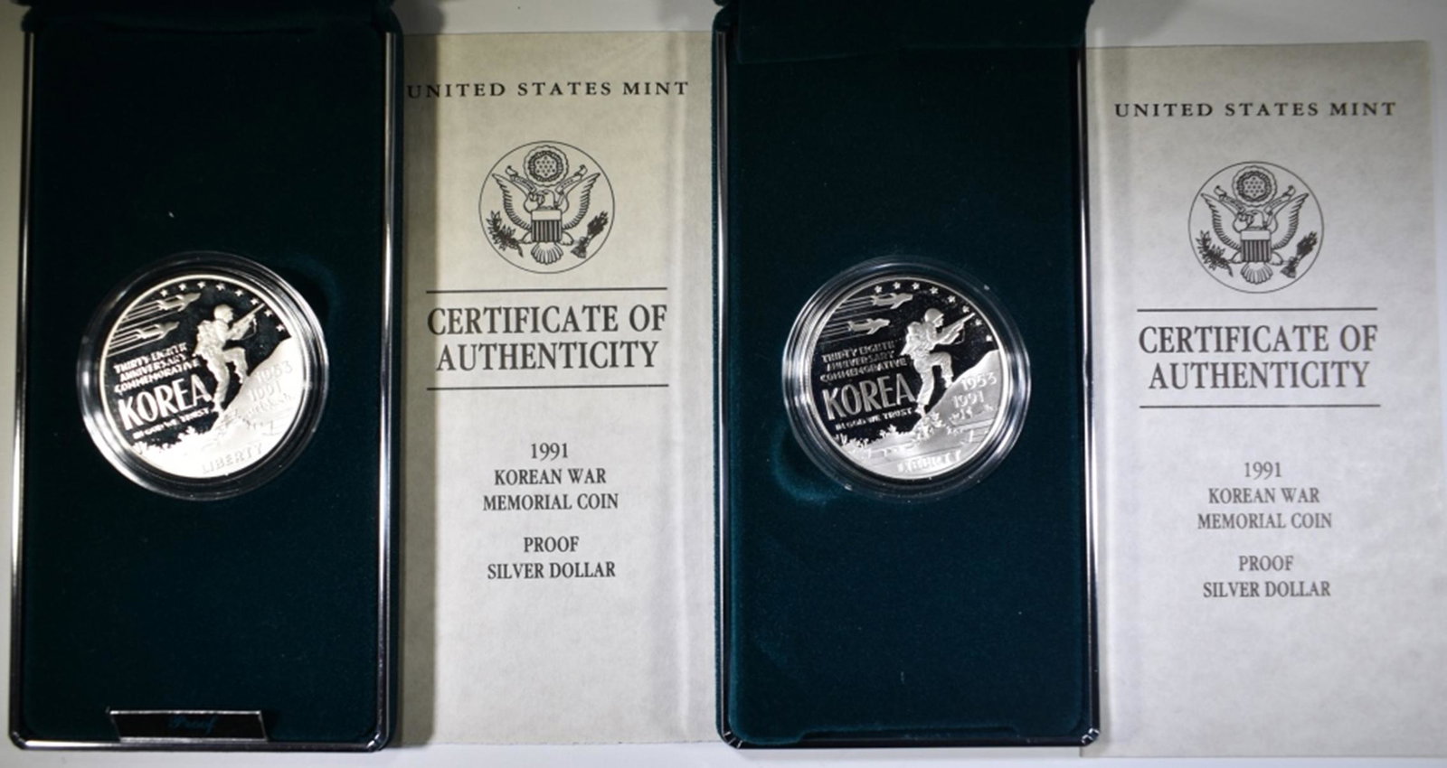2-1991 KOREAN WAR MEMORIAL PF SILVER DOLLARS: IN ORIG PACKAGING ESTIMATE $65 - $75.