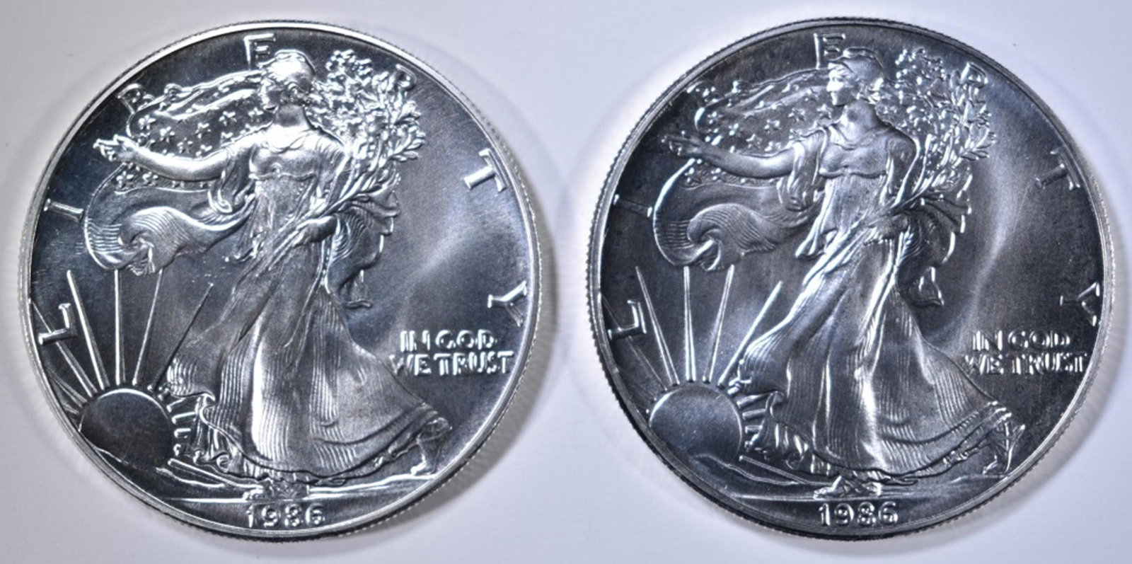 2-1986 BU AMERICAN SILVER EAGLES: BID WITH SILVER CITY AUCTIONS ESTIMATE $100 - $125.