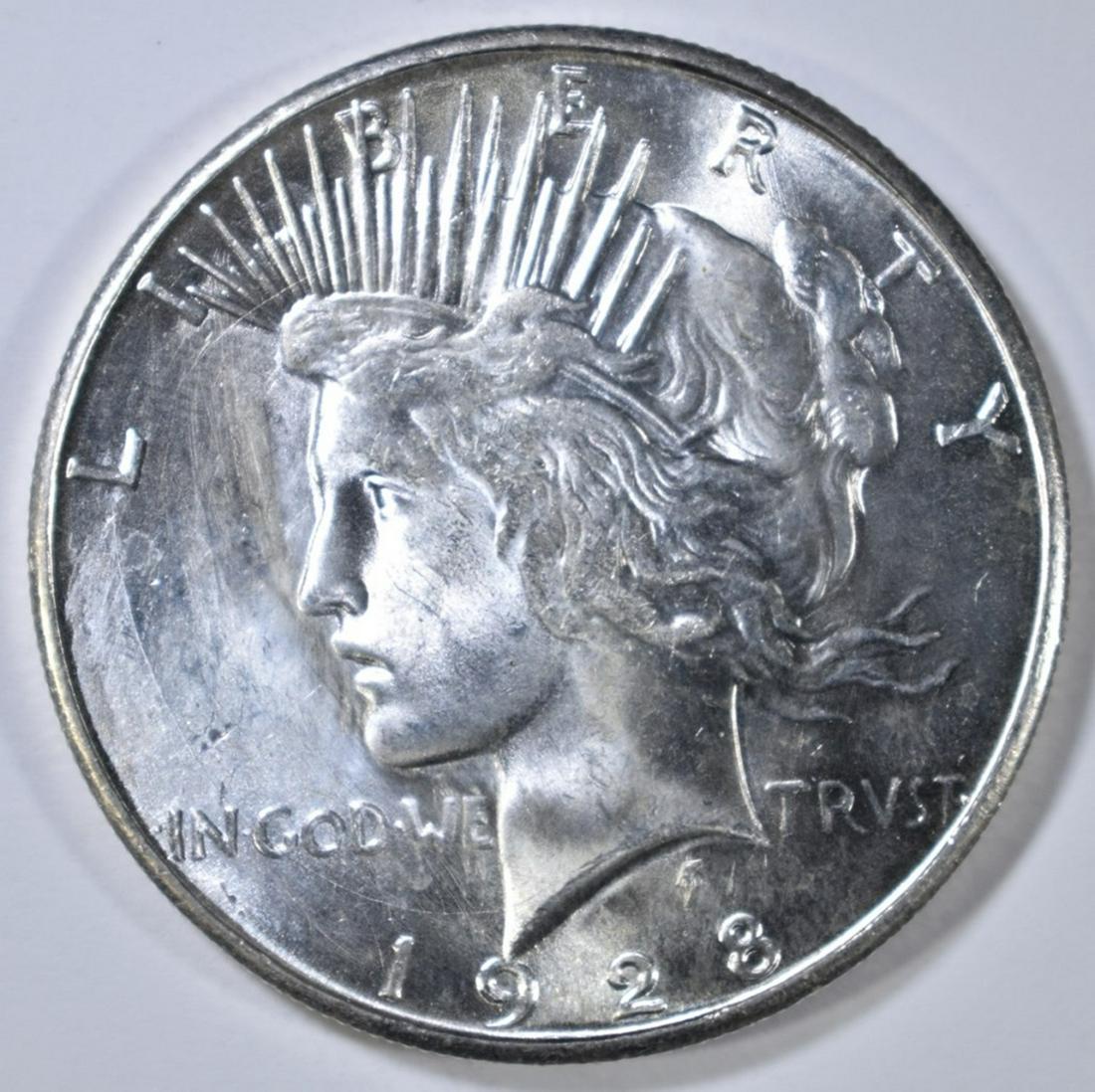 1928-S PEACE DOLLAR GEM BU CLEANED: LEADERS IN ONLINE AUCTIONS. ESTIMATE $600 - $700.