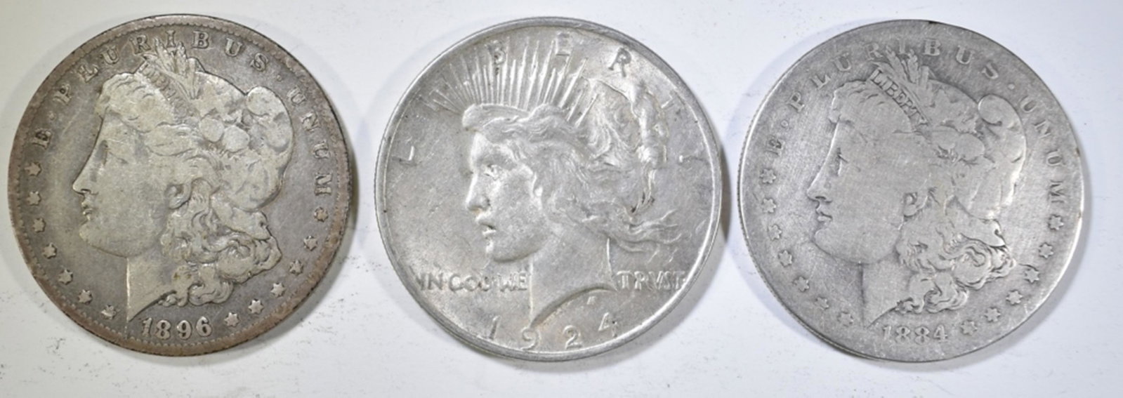 3-CIRC SILVER DOLLARS:: 1884-S, 1896-O MORGAN & 1924 PEACE ESTIMATE $110 - $130.