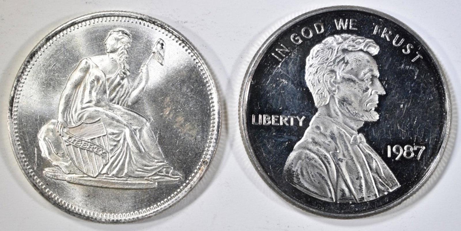 2-COIN REPLICA ONE OUNCE .999 SILVER ROUNDS: TOP RATED AUCTION HOUSE ESTIMATE $85 - $100.
