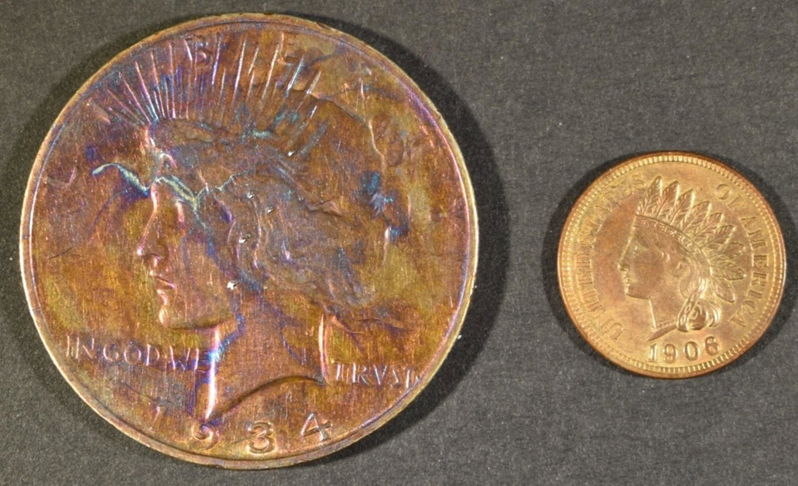 LOT OF 2 TYPE COINS:: 1906 INDIAN HEAD CENT CH BU RB & 1934-D PEACE DOLLAR FINE - TONED OBV. ESTIMATE $90 - $110.