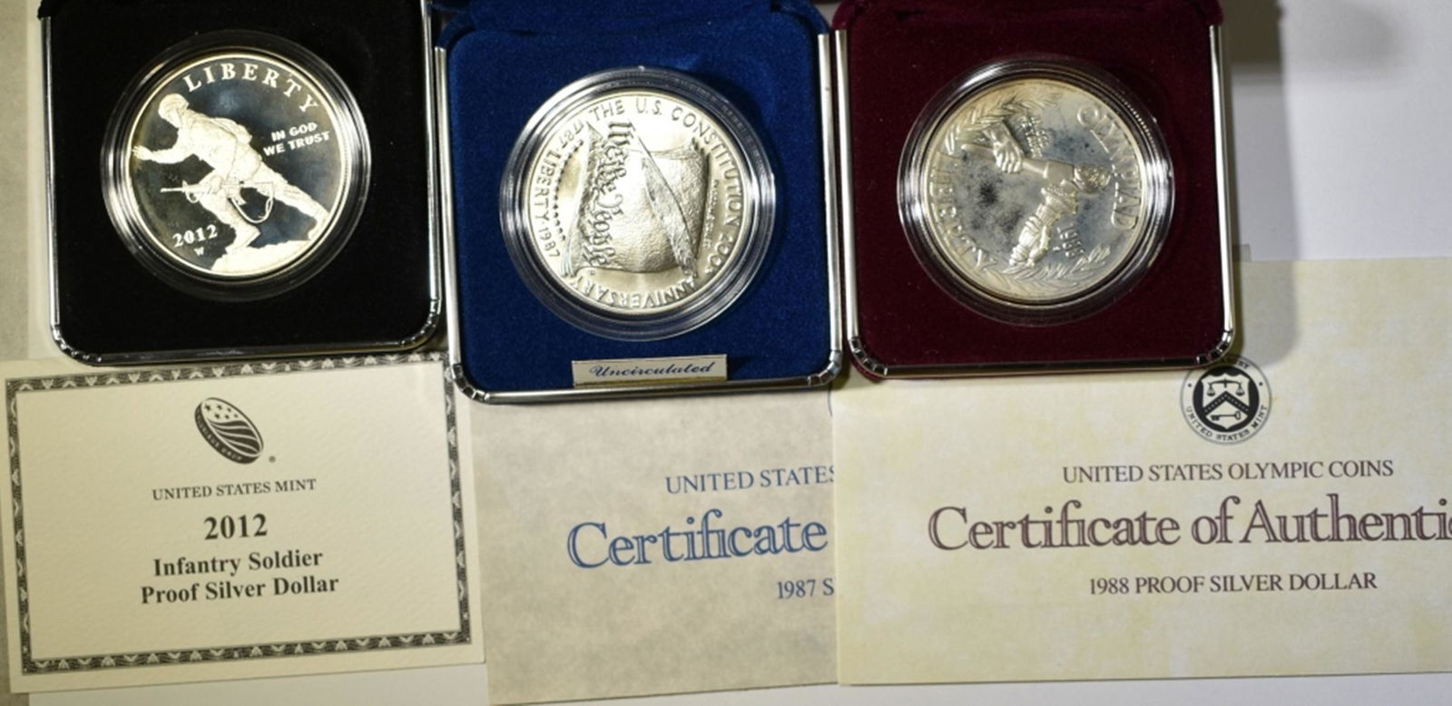 3-MODERN PROOF COMMEM SILVER DOLLARS (1 of 1)