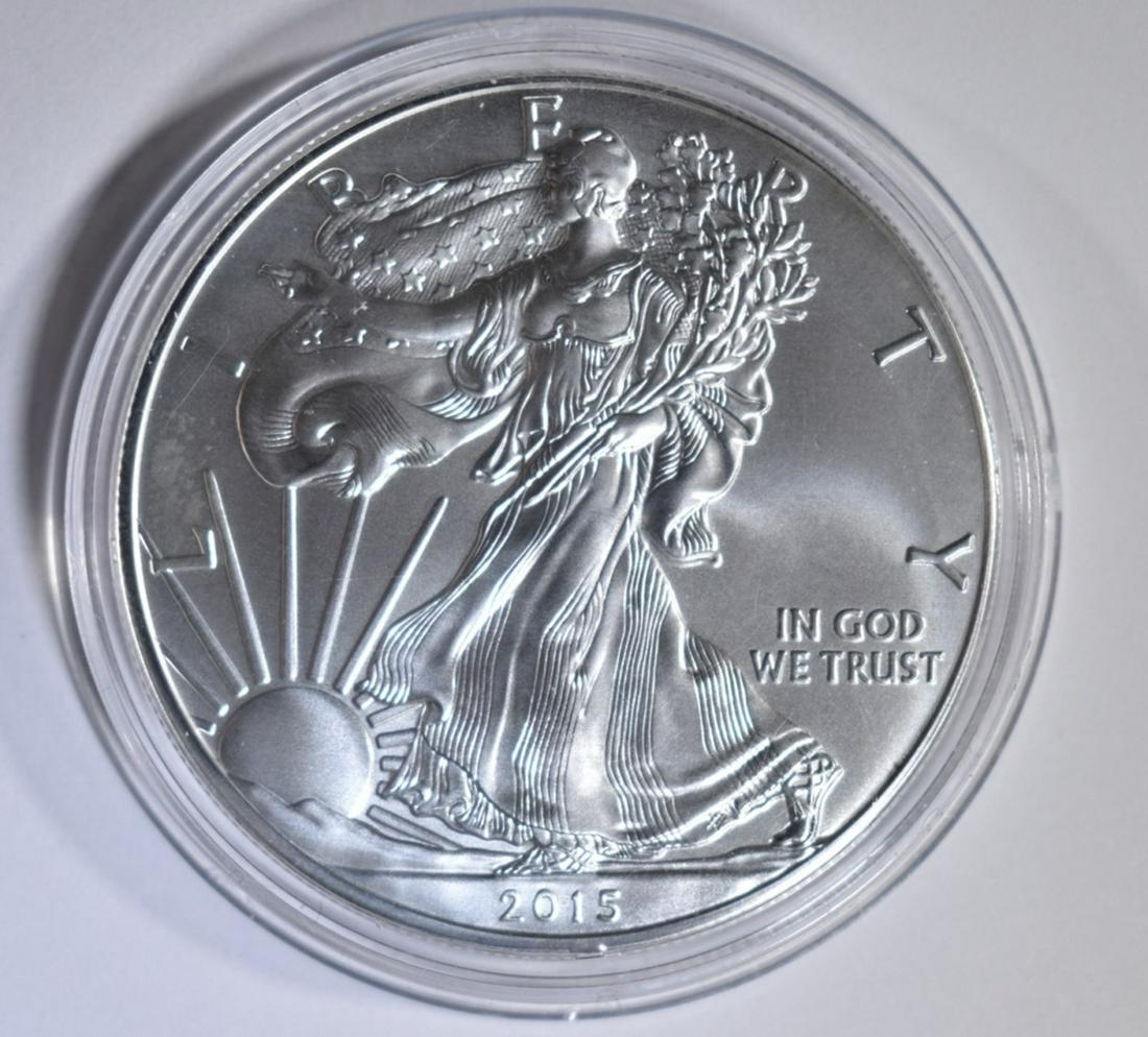 2015-W SILVER EAGLE IN CAPSULE: BID WITH SILVER CITY AUCTIONS. ESTIMATE $90 - $110.