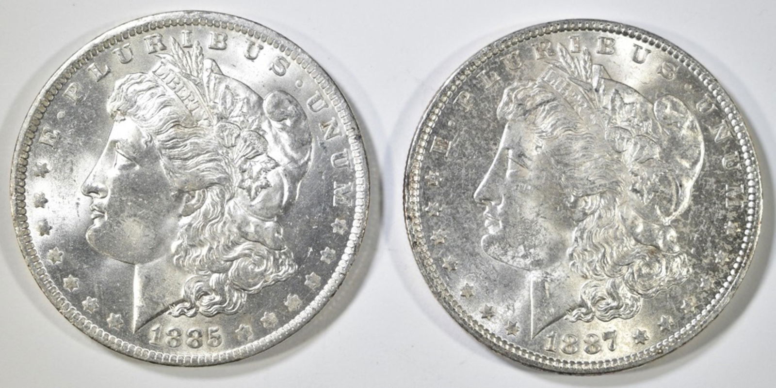 1885-O AU & 1887 BU MORGAN DOLLARS (1 of 2)