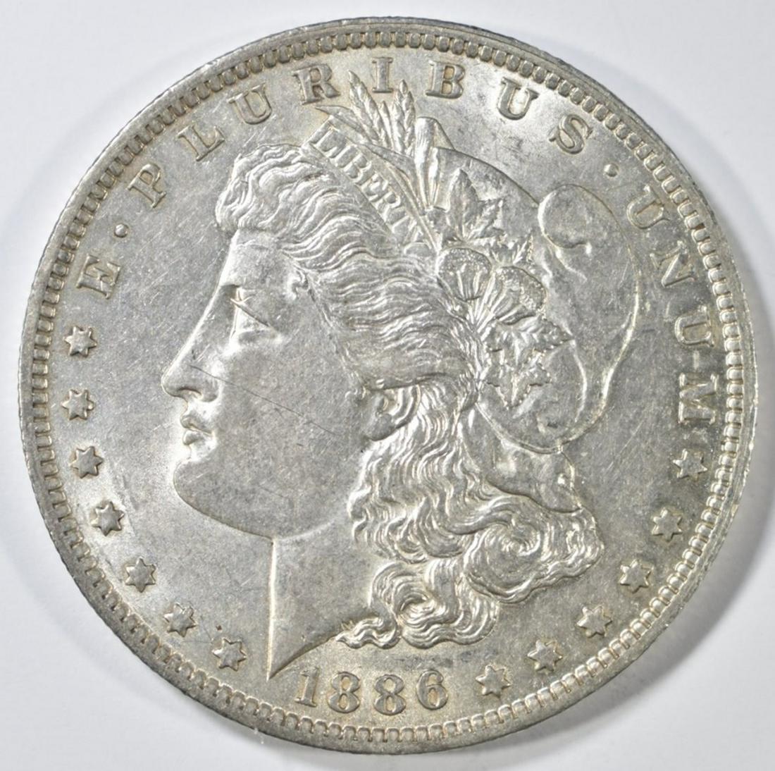 1886-O MORGAN DOLLAR  AU/BU (1 of 2)