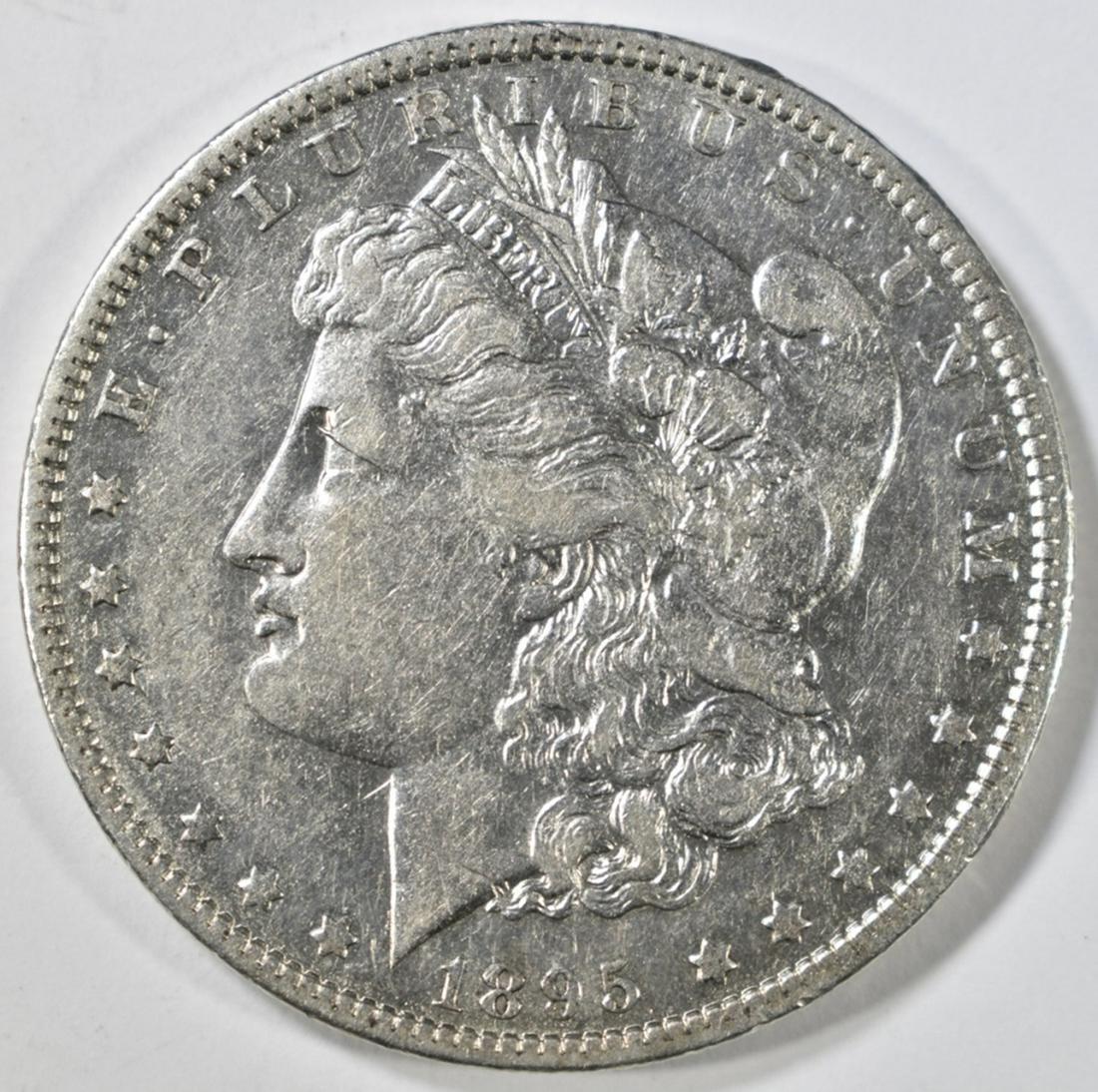 1895-O MORGAN DOLLAR AU: TOP RATED AUCTION HOUSE ESTIMATE $1000 - $1200.