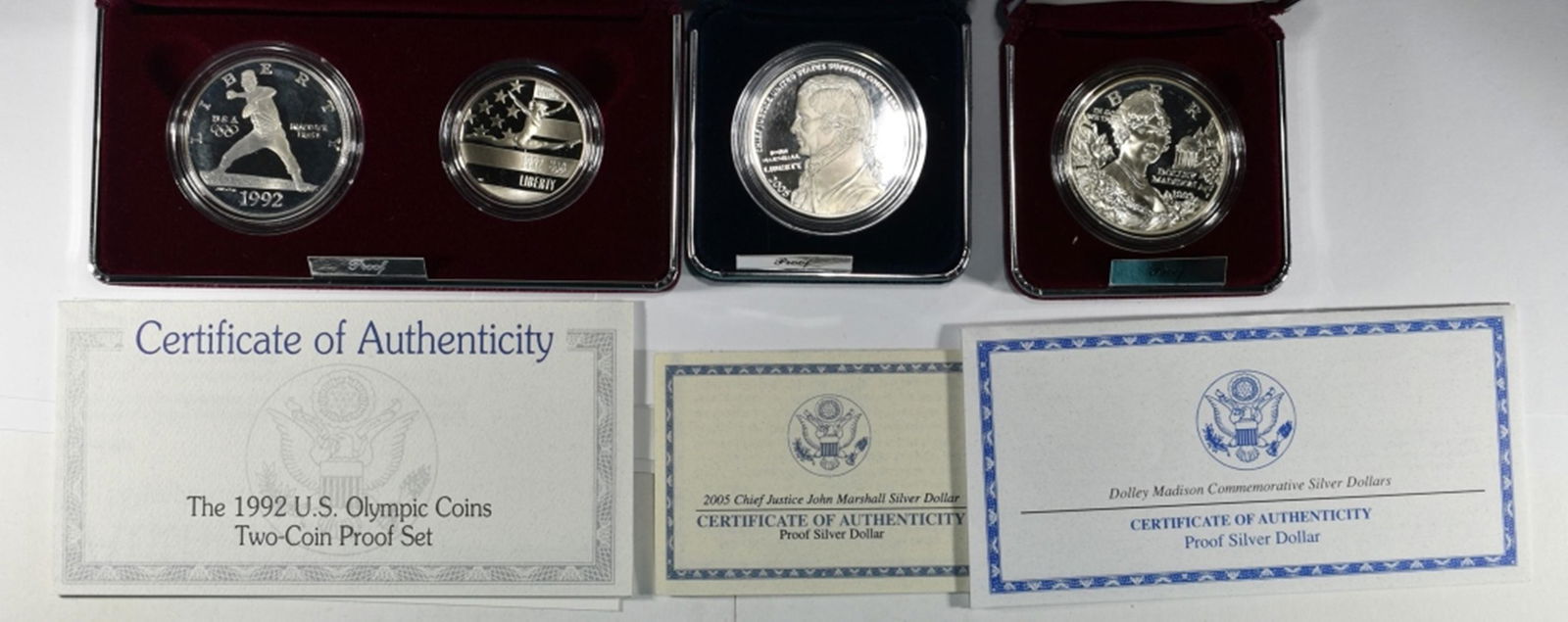 3-MODERN PROOF COMMEM SILVER DOLLARS:: 1992 OLYMPIC 2-COIN PROOF.1999 DOLLEY MADISON PROOF SILVER DOLLAR & 2005 JOHN MARSHALL PROOF SILVER DOLLAR ORIG PACKAGING ESTIMATE $90 - $110.