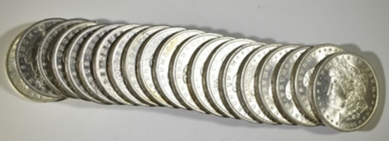 ORIGINAL ROLL OF 1885-O MORGAN DOLLARS  CH BU (1 of 2)