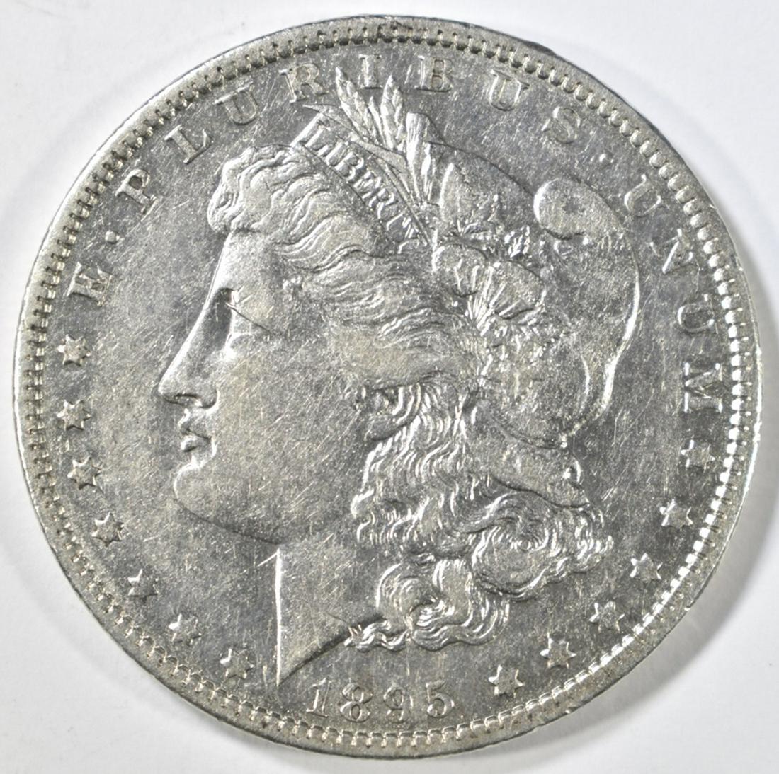 1895-O MORGAN DOLLAR AU: TOP RATED AUCTION HOUSE ESTIMATE $1000 - $1200.