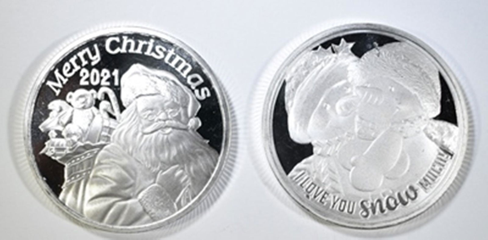 2-DIFFERENT ONE OUNCE .999 SILVER CHRISTMAS ROUNDS (1 of 2)
