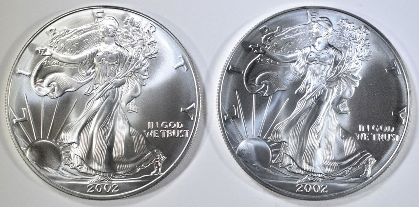 (2) 2002 UNC AMERICAN SILVER EAGLES (1 of 2)