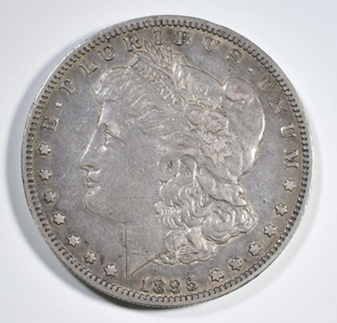 1895-O MORGAN DOLLAR XF/AU: TOP RATED AUCTION HOUSE. ESTIMATE $700 - $800.