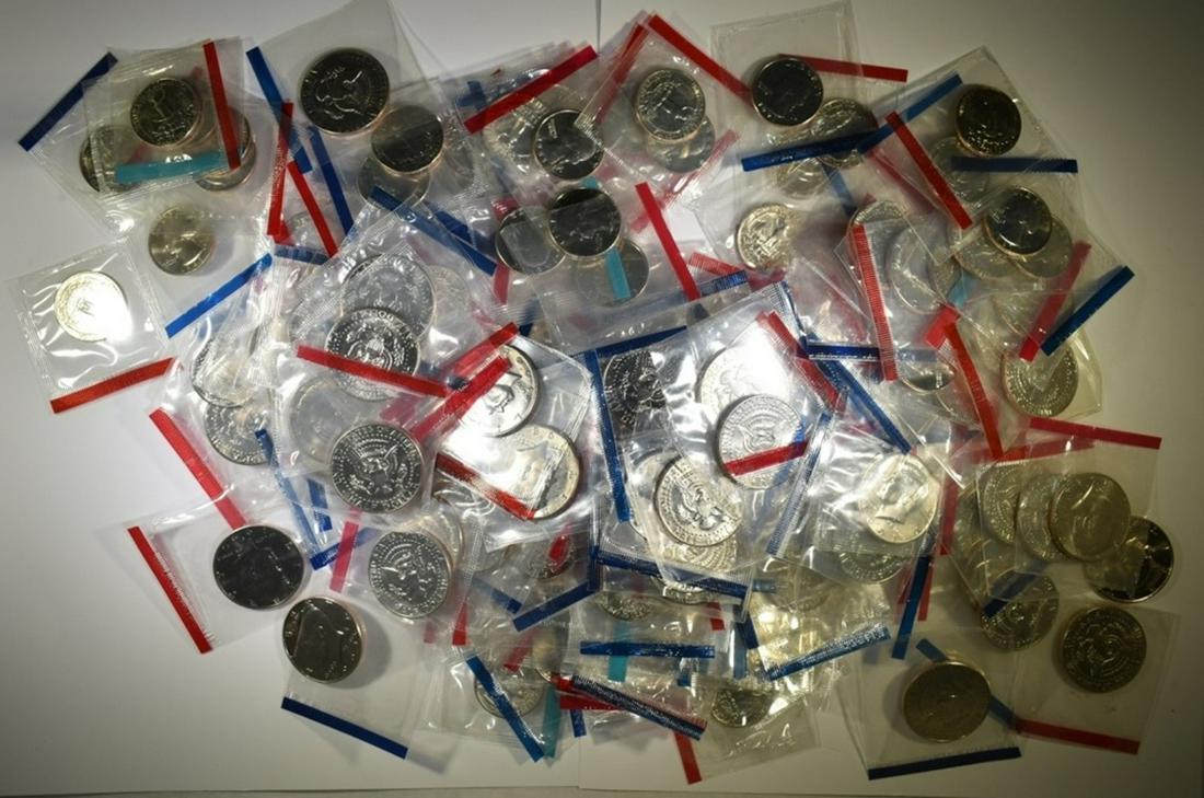 LOT OF UNC COINS FROM MINT SETS:: 85 MIXED DATE WASHINGTON QUARTERS & 87 MIXED DATE KENNEDY HALVES. ESTIMATE $90 - $110.