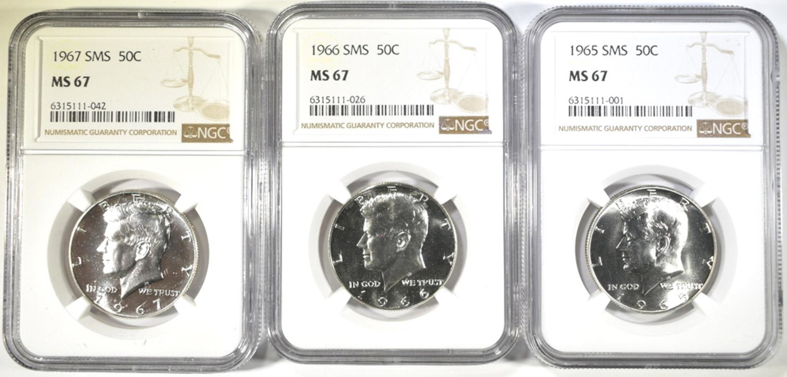 1965, 66, 67 SMS KENNEDY HALVES NGC MS-67: LEADERS IN ON-LINE AUCTIONS ESTIMATE $200 - $250.