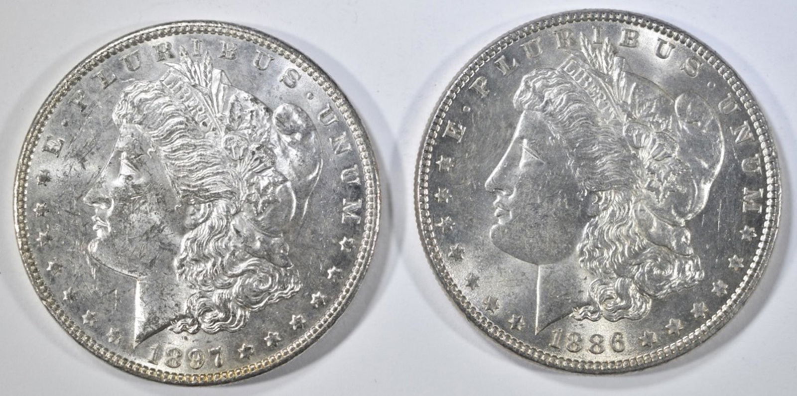 1886 & 1897 MORGAN DOLLARS BU (1 of 2)