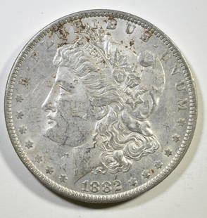 1882-O/S MORGAN DOLLAR AU: BID WITH SILVER CITY AUCTIONS ESTIMATE $100 - $150.