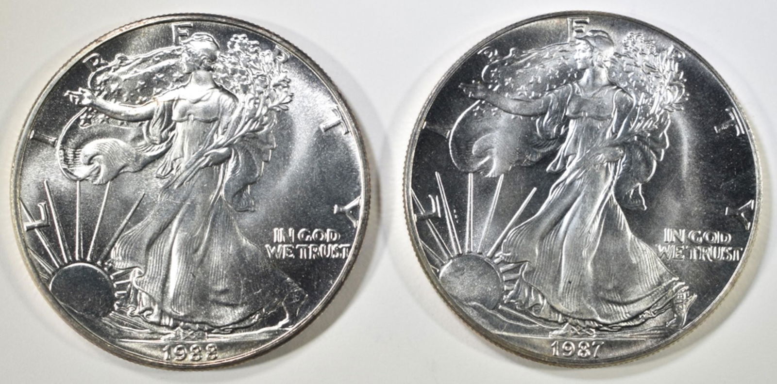 1987 & 88 UNC AMERICAN SILVER EAGLES (1 of 2)