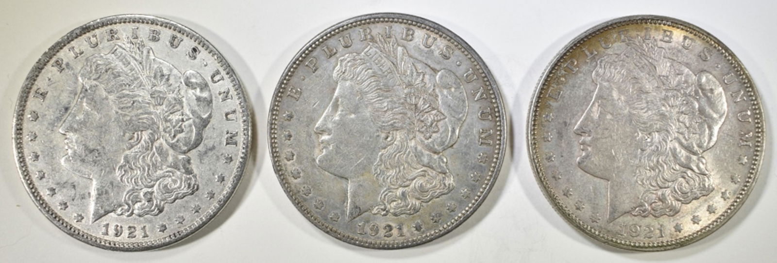 (3) 1921 CIRC MORGAN DOLLARS (1 of 2)
