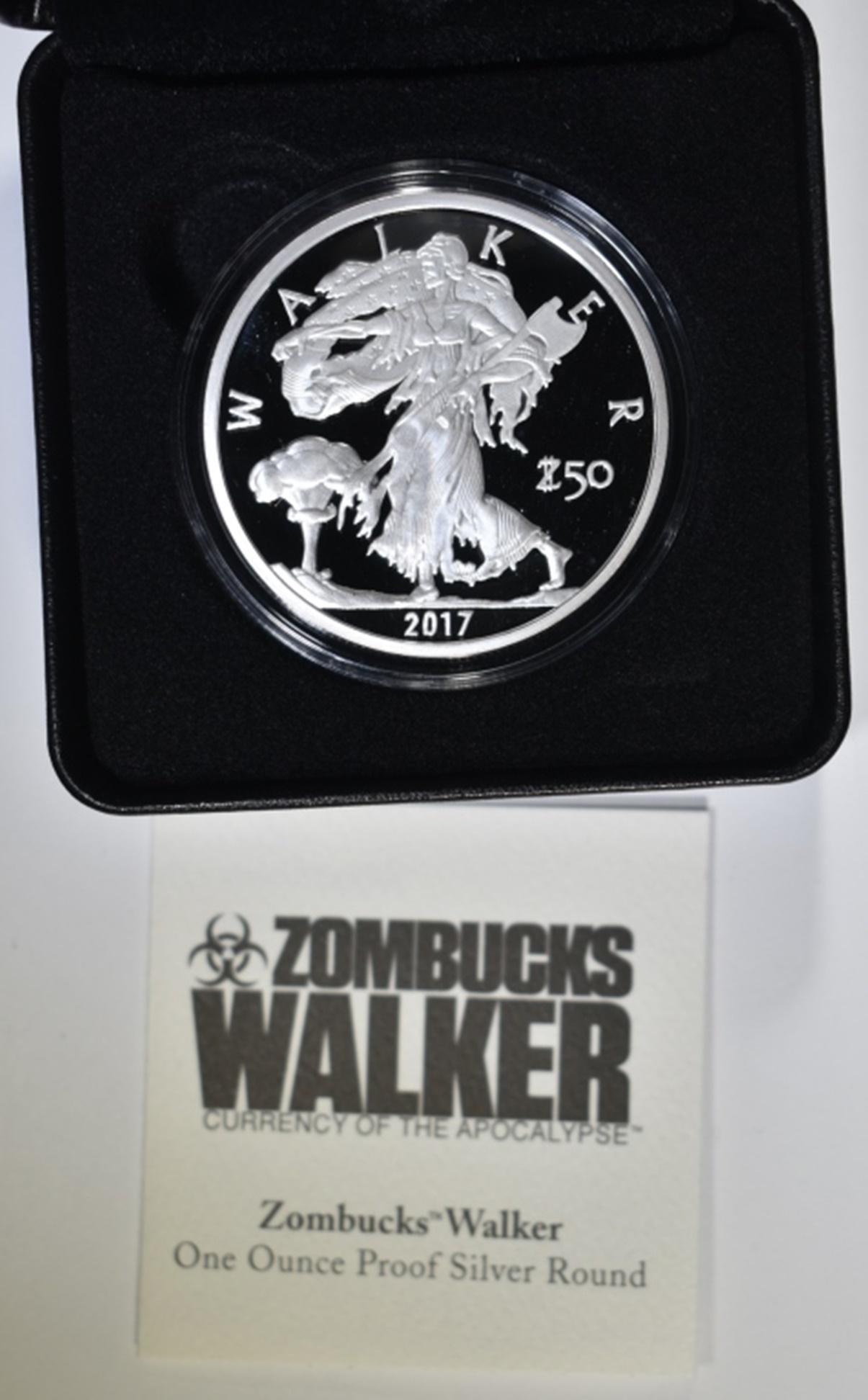 ZOMBUCKS 1 OZ SILVER CURRENCY OF THE APOCALYPSE: 2017 WALKER. IN ORIGINAL PACKAGING. ESTIMATE $90 - $110.