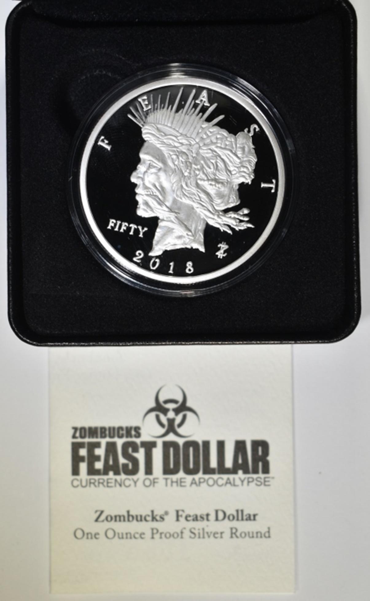 ZOMBUCKS 1 OZ SILVER CURRENCY OF THE APOCALYPSE: 2018 FEAST DOLLAR. IN ORIGINAL PACKAGING. ESTIMATE $90 - $110.
