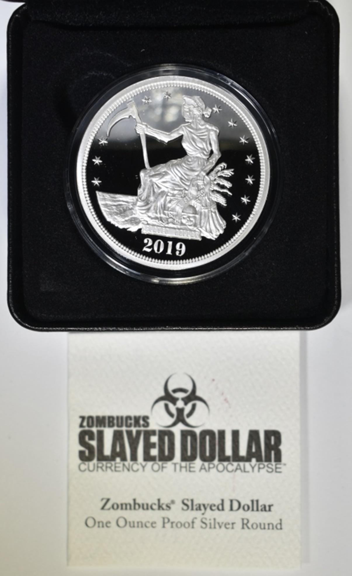 ZOMBUCKS 1 OZ SILVER CURRENCY OF THE APOCALYPSE: 2019 SLAYED DOLLAR. IN ORIGINAL PACKAGING. ESTIMATE $90 - $110.