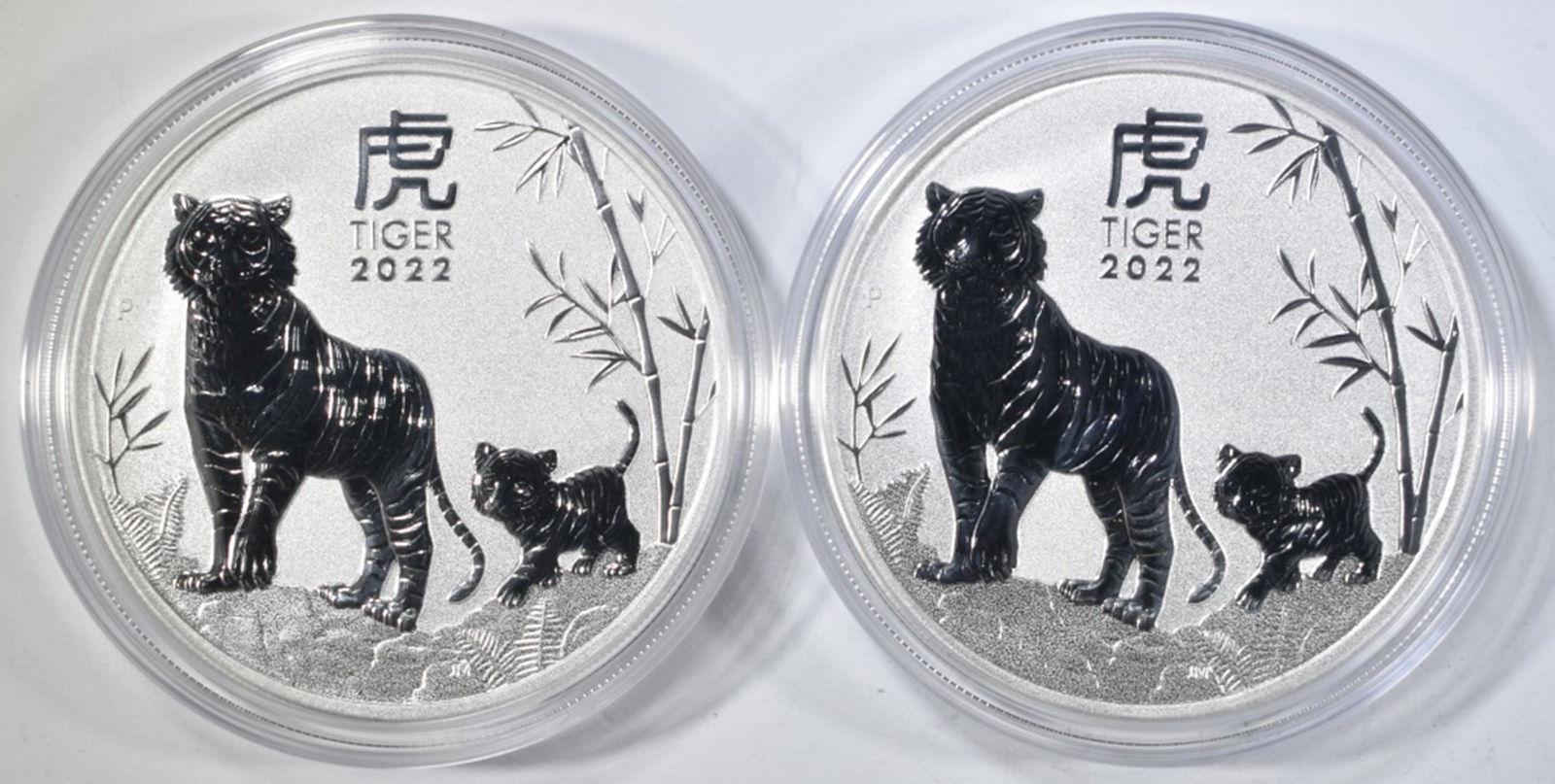 (2) 2022 AUSTRALIA BU SILVER DOLLARS: YEAR OF THE TIGER. ESTIMATE $100 - $125.