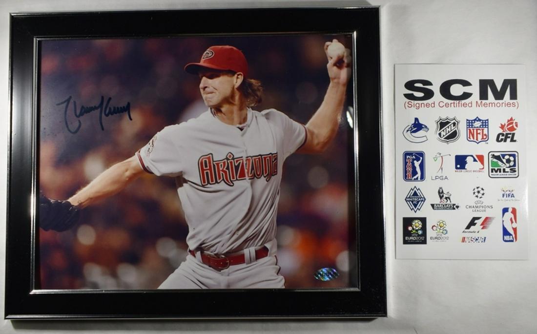 RANDY JOHNSON SIGNED PHOTO 8X 10 FRAMED: WEEKLY COIN & CURRENCY AUCTIONS ESTIMATE $60 - $80.