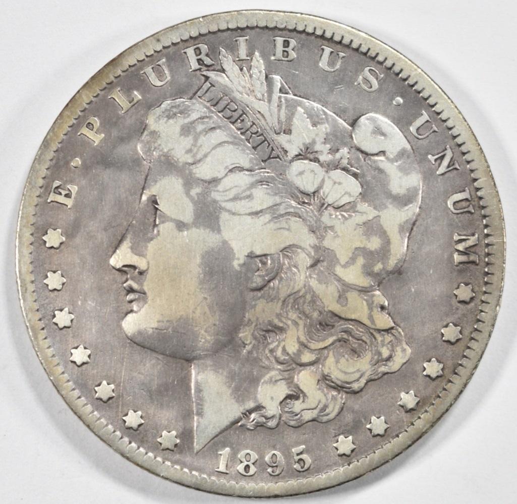 1895-O MORGAN DOLLAR F/VF: TOP RATED AUCTION HOUSE ESTIMATE $400 - $450.
