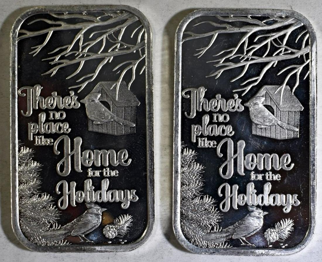 (2) 2019 1 OZ .999 HOME FOR THE HOLIDAYS SIL BARS: TOP RATED AUCTION HOUSE ESTIMATE $100 - $150.