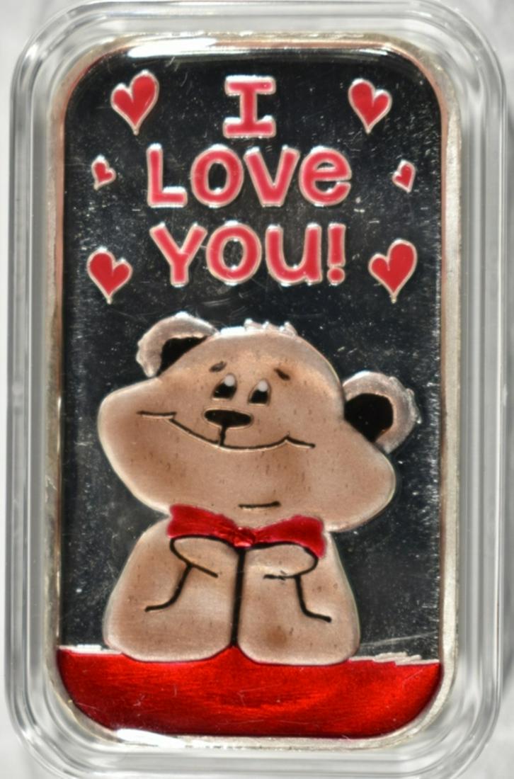 ONE OZ .999 ENAMELED I LOVE YOU BEAR SILVER BAR: LEADERS IN ON-LINE AUCTIONS ESTIMATE $75 - $100.