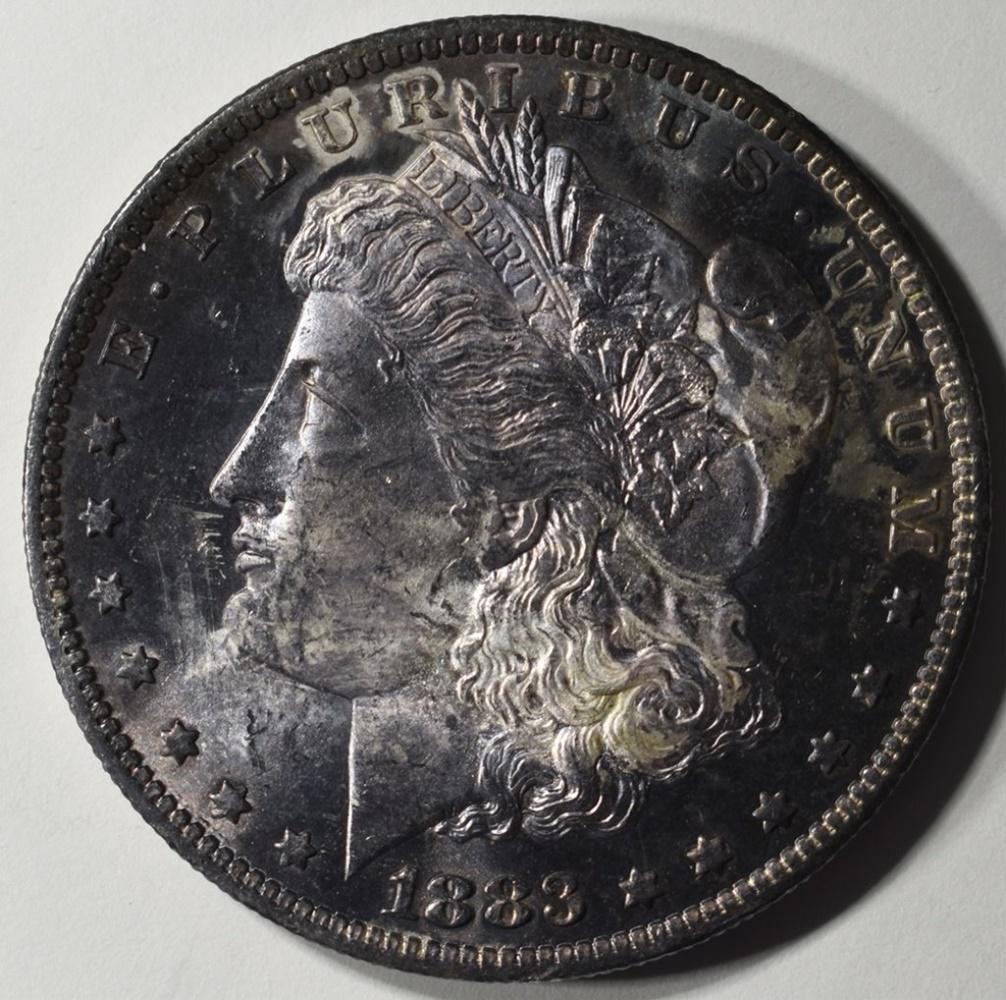 1883-O MORGAN DOLLAR CH BU TONED (1 of 2)