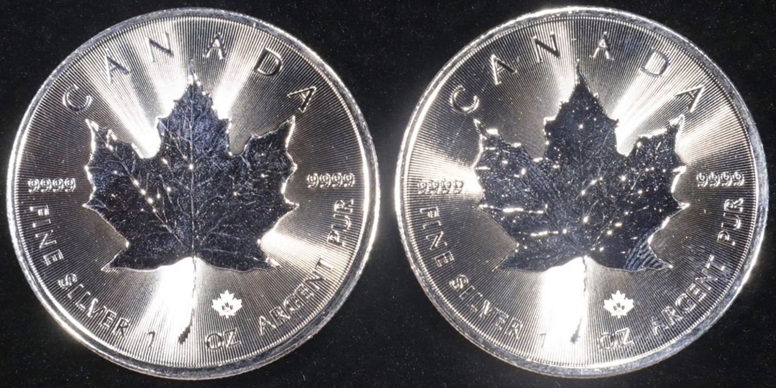 (2) 1 OZ .999 SILVER 2024 CANADIAN MAPLE ROUNDS: WEEKLY COIN & CURRENCY AUCTIONS ESTIMATE $140 - $190.